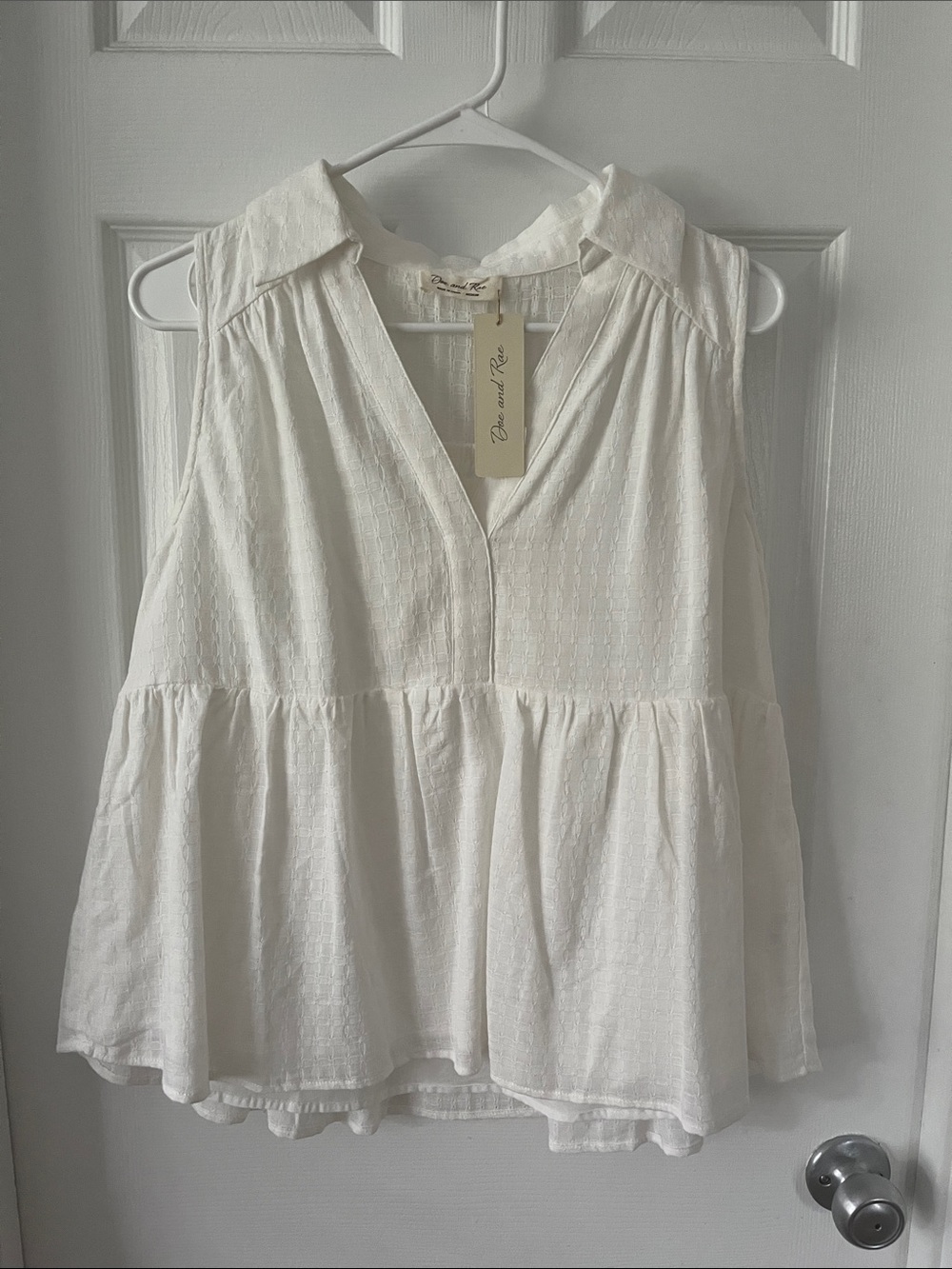 Doe & Rae White Sleeveless Peplum Top with Collar